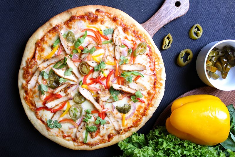 Spicy Hawaiian Inferno pizza with pineapple and jalapeños