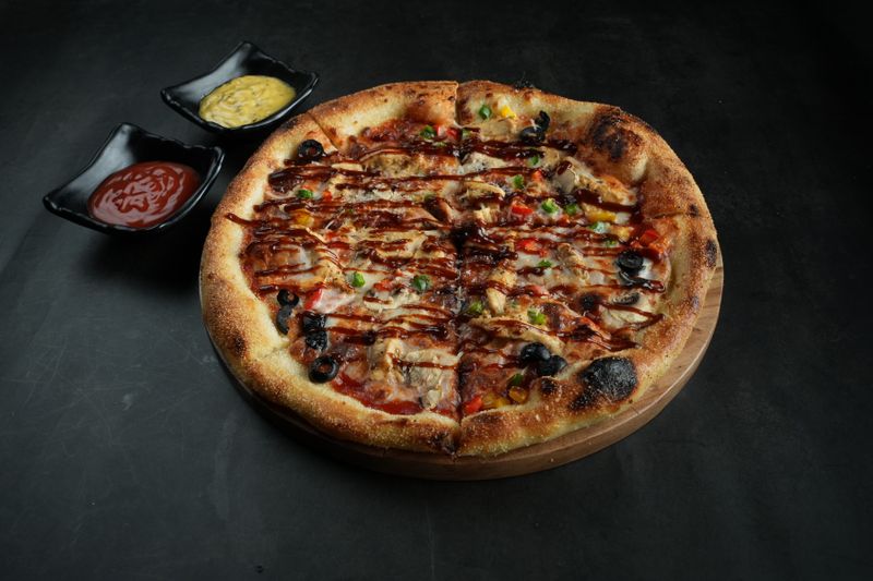 Buffalo Blaze pizza with spicy buffalo sauce and chicken