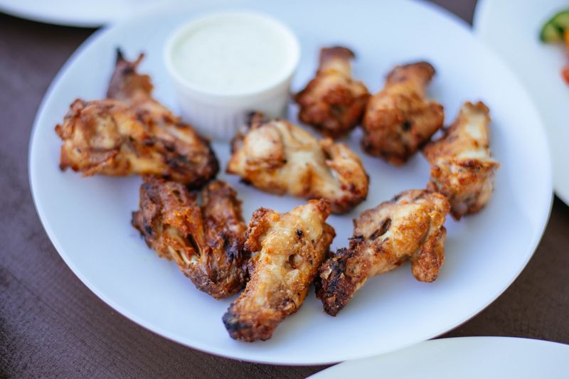 Boneless Wings crispy tenders with dipping sauces